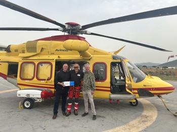 Mat Cullinane and Rob Brothwood, operating department practitioners at LUHFT, with a member of the Italian Air Ambulance Service in Tuscany, who are currently trialling the LEAFix device as part of their service